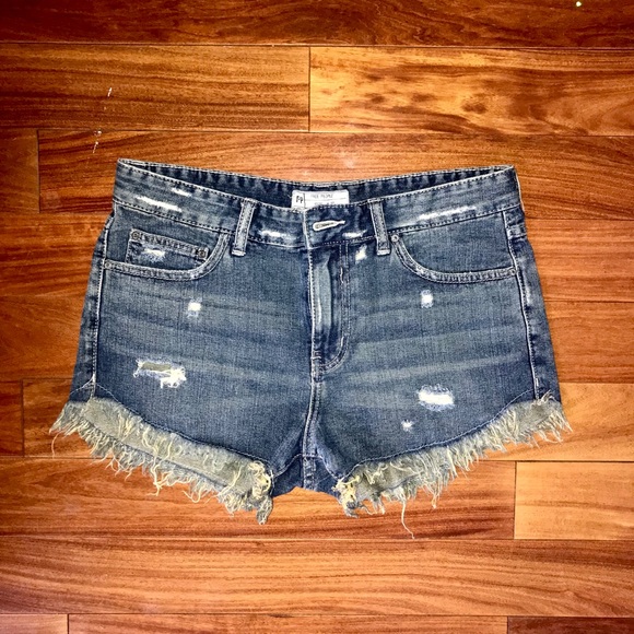 Distressed Free People denim shorts - Picture 1 of 4